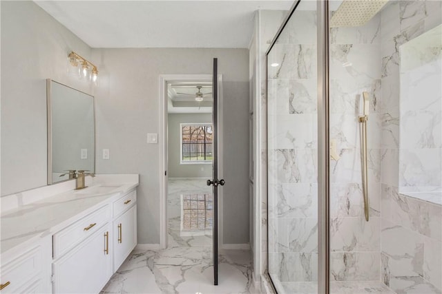 full bath with marble finish floor, a marble finish shower, a ceiling fan, vanity, and baseboards