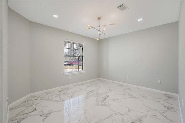 empty room featuring marble finish floor, recessed lighting, visible vents, a chandelier, and baseboards