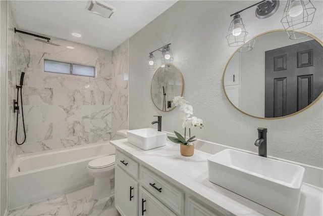 bathroom featuring toilet, marble finish floor, a sink, and bathing tub / shower combination