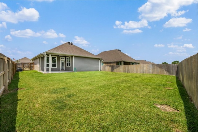 4842 Native Tree Ln, College Station, TX 77845 - back of house featuring a patio area and a shingled roof