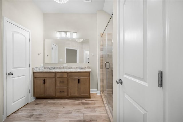 4842 Native Tree Ln, College Station, TX 77845 - bathroom with double vanity and a shower stall