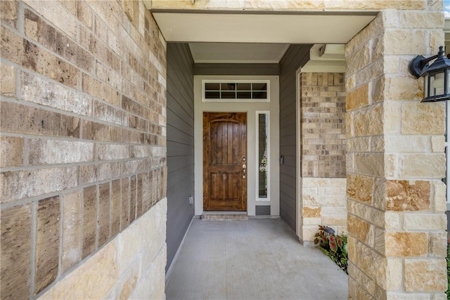 4842 Native Tree Ln, College Station, TX 77845 - doorway to property featuring brick siding