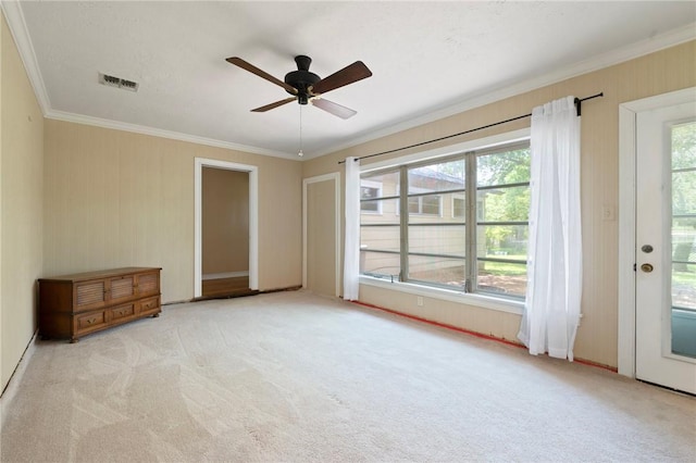 1210 Munson Ave, College Station, TX 77840 - carpeted empty room featuring ornamental molding and ceiling fan