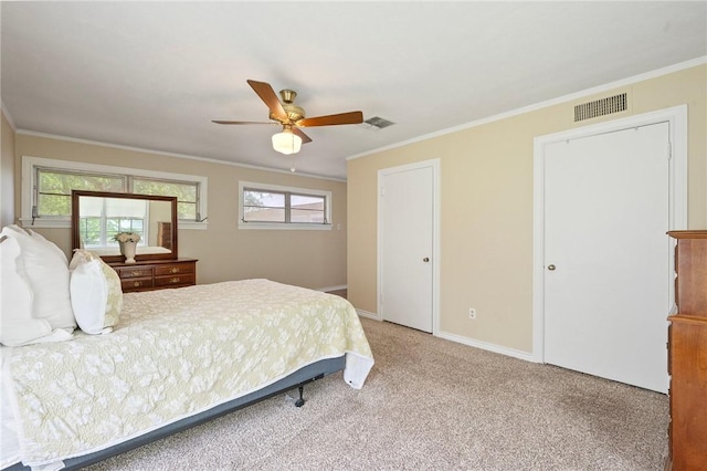 1210 Munson Ave, College Station, TX 77840 - carpeted bedroom with ornamental molding, baseboards, and a ceiling fan
