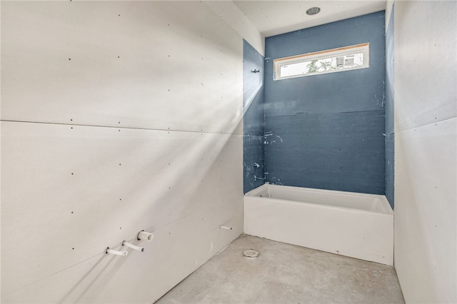 bathroom with concrete floors