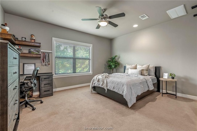 carpeted bedroom with ceiling fan