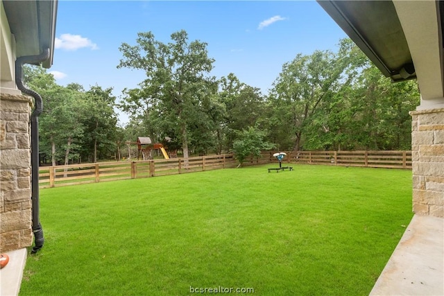 view of yard with a playground