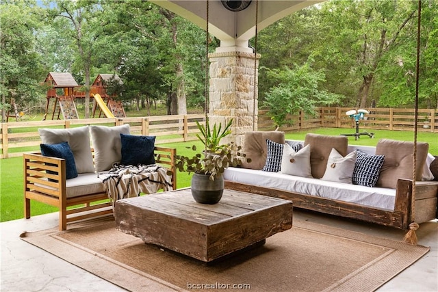 view of patio featuring outdoor lounge area and a playground