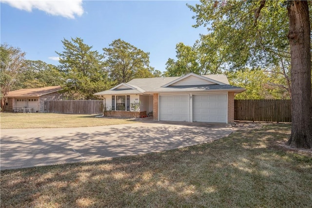 ranch-style house featuring brick siding, an attached garage, and fence