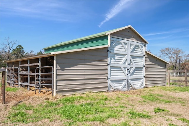 view of outbuilding with an exterior structure and an outdoor structure