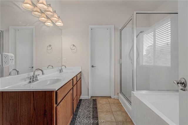 bathroom featuring tile patterned floors, vanity, and independent shower and bath