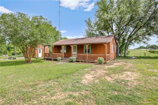 6508 Old Independence Rd, Brenham, TX 77833 - single story home featuring a porch and a front yard