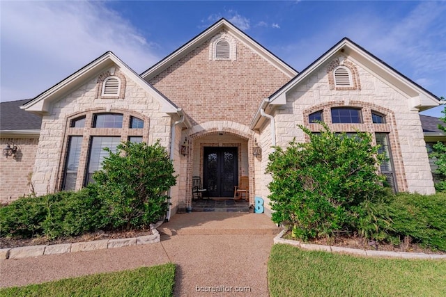 view of front facade featuring french doors