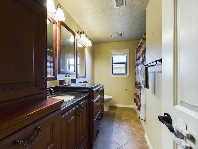 office space with light carpet, a raised ceiling, ceiling fan, ornamental molding, and a textured ceiling