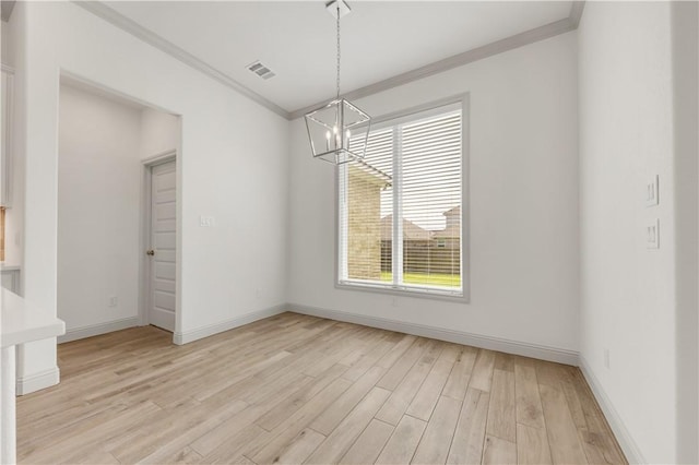 1615 Briscoe Manor Ct, College Station, TX 77845 - unfurnished dining area with crown molding, visible vents, baseboards, light wood-style floors, and a chandelier