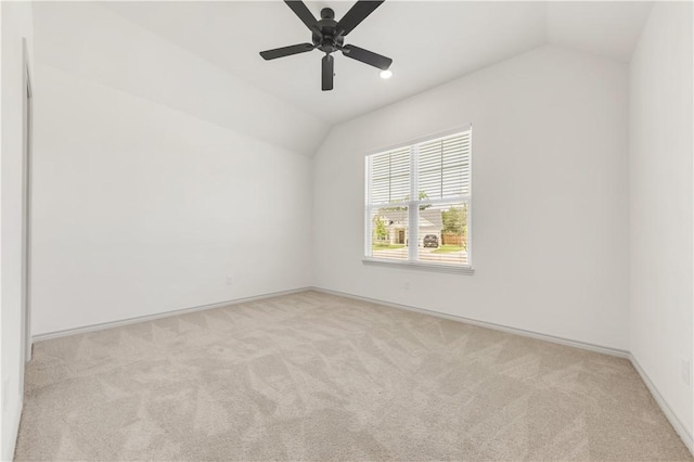 1615 Briscoe Manor Ct, College Station, TX 77845 - carpeted empty room featuring baseboards, lofted ceiling, and ceiling fan