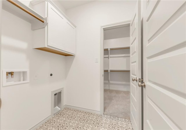 1615 Briscoe Manor Ct, College Station, TX 77845 - laundry room with baseboards, washer hookup, hookup for an electric dryer, and cabinet space