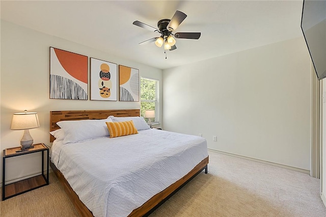 6209 Cromwell Ct, Bryan, TX 77802 - carpeted bedroom with a ceiling fan and baseboards