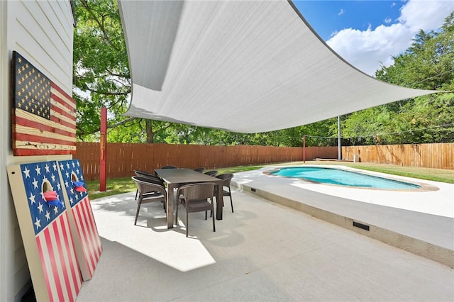 6209 Cromwell Ct, Bryan, TX 77802 - view of swimming pool with a fenced backyard, outdoor dining space, a patio, and a hot tub