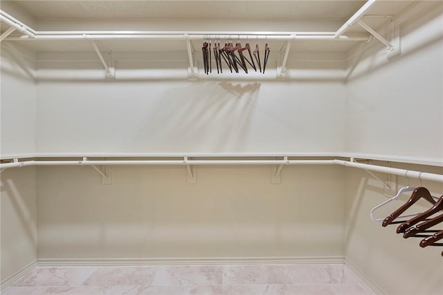 6209 Cromwell Ct, Bryan, TX 77802 - walk in closet with marble finish flooring