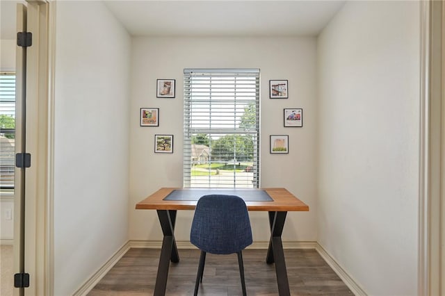 office with dark wood-type flooring