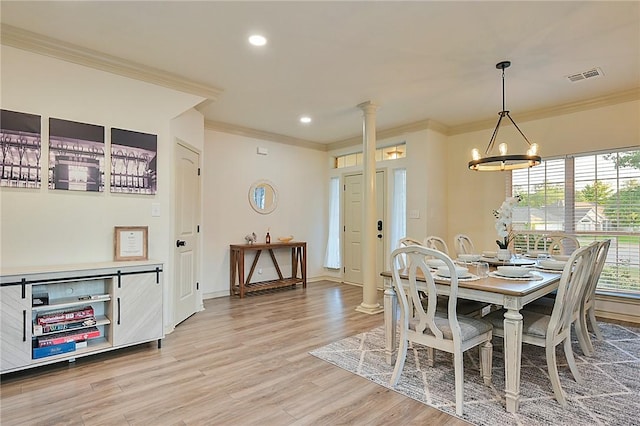 6209 Cromwell Ct, Bryan, TX 77802 - dining space featuring decorative columns, ornamental molding, a chandelier, light wood finished floors, and recessed lighting