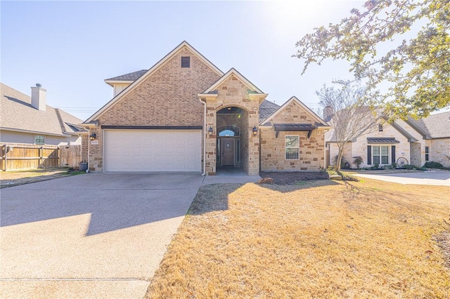 view of front of property with a garage