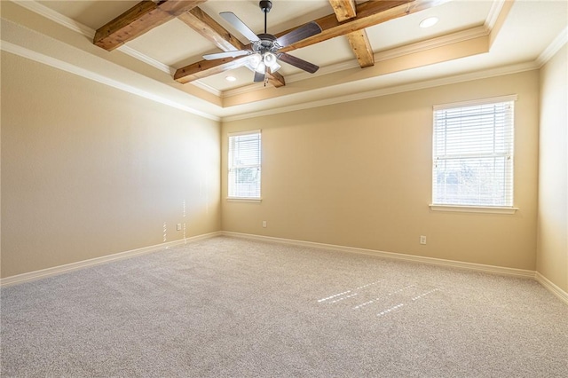 spare room with beamed ceiling, coffered ceiling, carpet, and crown molding