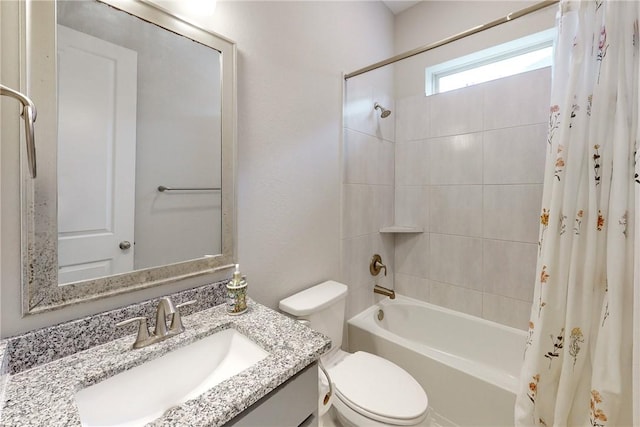 full bathroom featuring vanity, toilet, and shower / bath combo with shower curtain