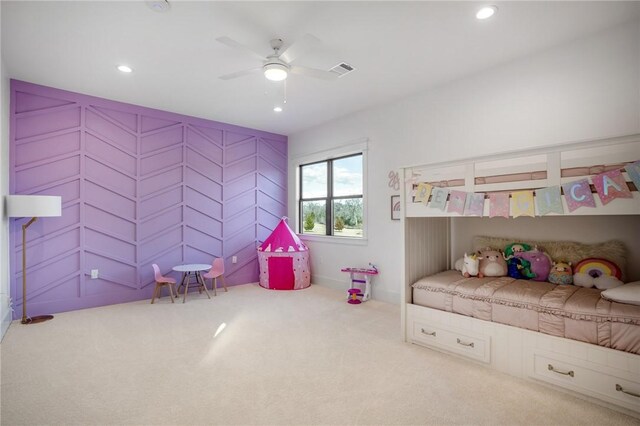 carpeted bedroom with ceiling fan