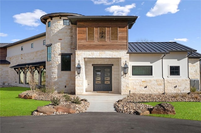 view of front of house featuring french doors