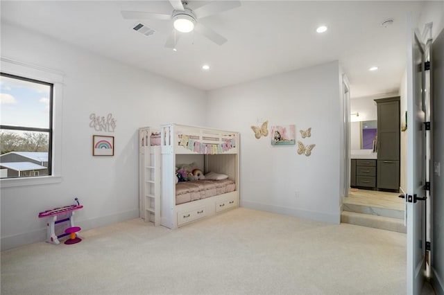 carpeted bedroom with ceiling fan