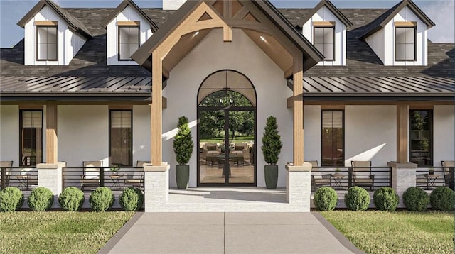 entrance to property with covered porch