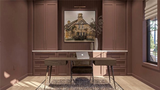 office featuring plenty of natural light and light hardwood / wood-style floors