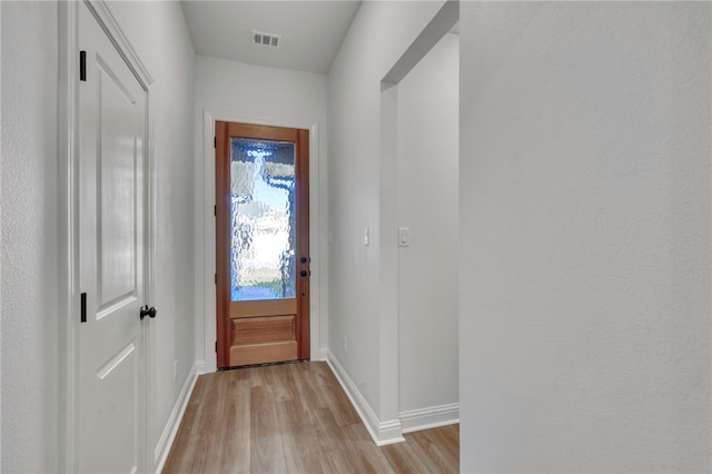 doorway featuring light hardwood / wood-style flooring