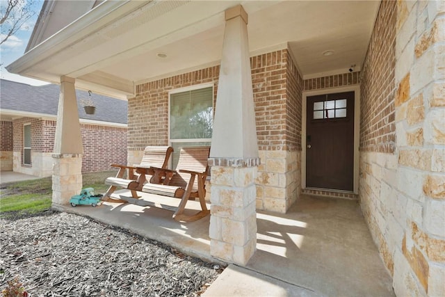 doorway to property with a porch