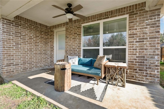 view of patio featuring ceiling fan