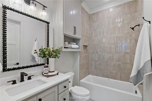 full bathroom with tiled shower / bath combo, toilet, and vanity