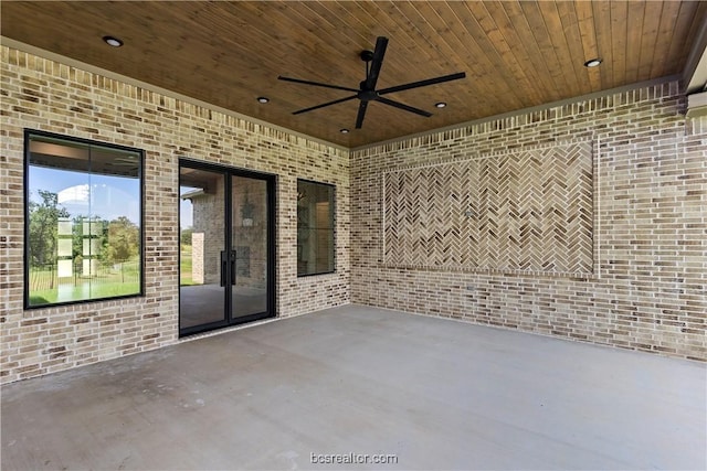 view of patio with french doors and ceiling fan