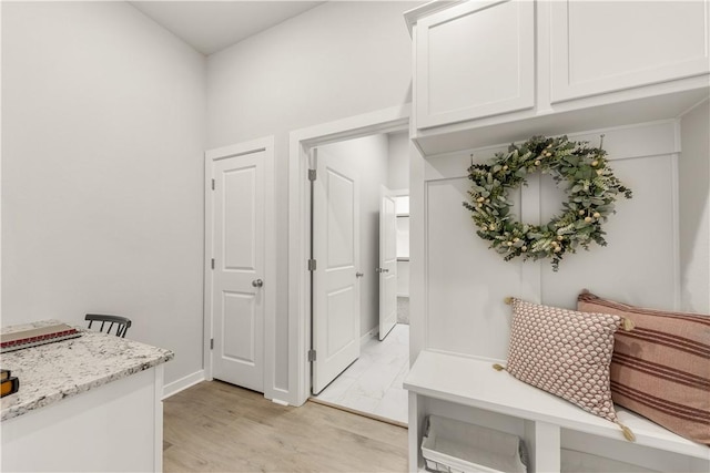 mudroom with light wood-type flooring