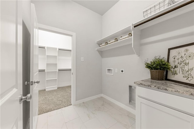 laundry area with light carpet, hookup for a washing machine, and hookup for an electric dryer