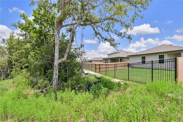 view of yard with fence