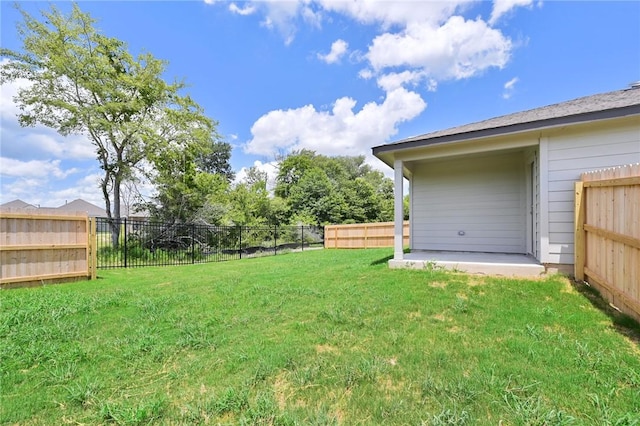 view of yard featuring a fenced backyard and a patio area