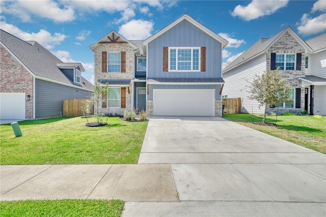 view of front of home featuring a garage and a front lawn