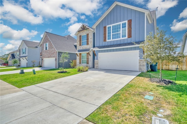 view of front of home featuring a front yard and a garage