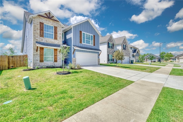 view of front of house with a front lawn and a garage