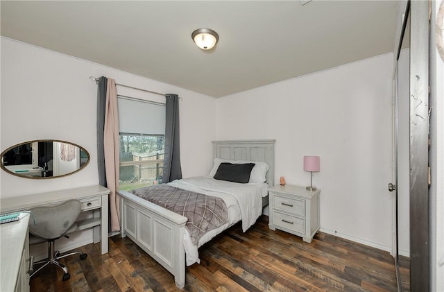 bedroom featuring dark wood-type flooring