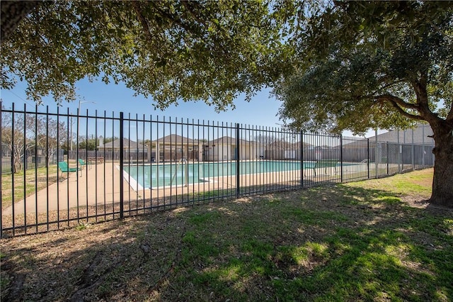 community pool with fence