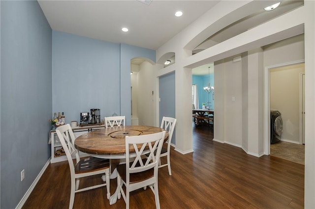 dining space featuring recessed lighting, baseboards, an inviting chandelier, and wood finished floors