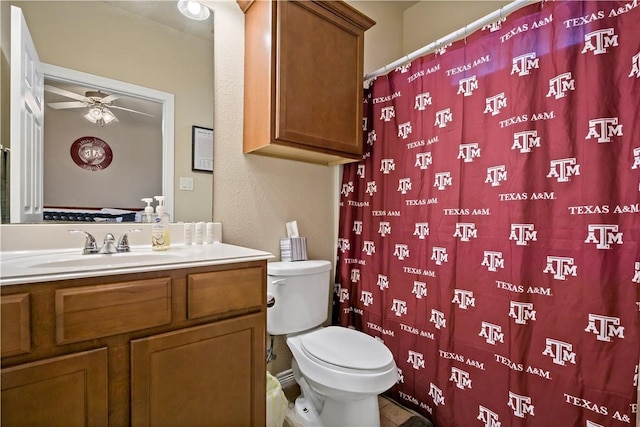 bathroom featuring tile patterned flooring, vanity, toilet, and a shower with shower curtain